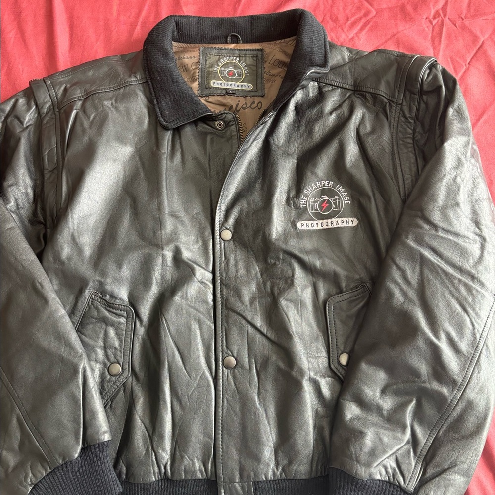 Sharper image, leather photography jacket with removable sleeves